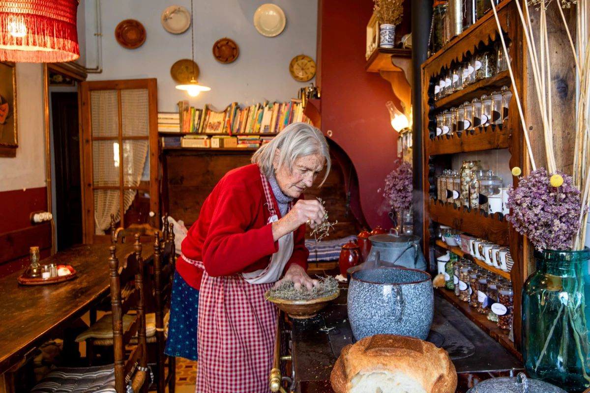 Angela Farre Palacin, 87, adds thyme to boiling water for sopa de farigola, a traditional soup in Catalonia, Spain. This blend of thyme, day-old bread, eggs and olive oil is considered a remedy for all sorts of ailments. And we've got the recipe.