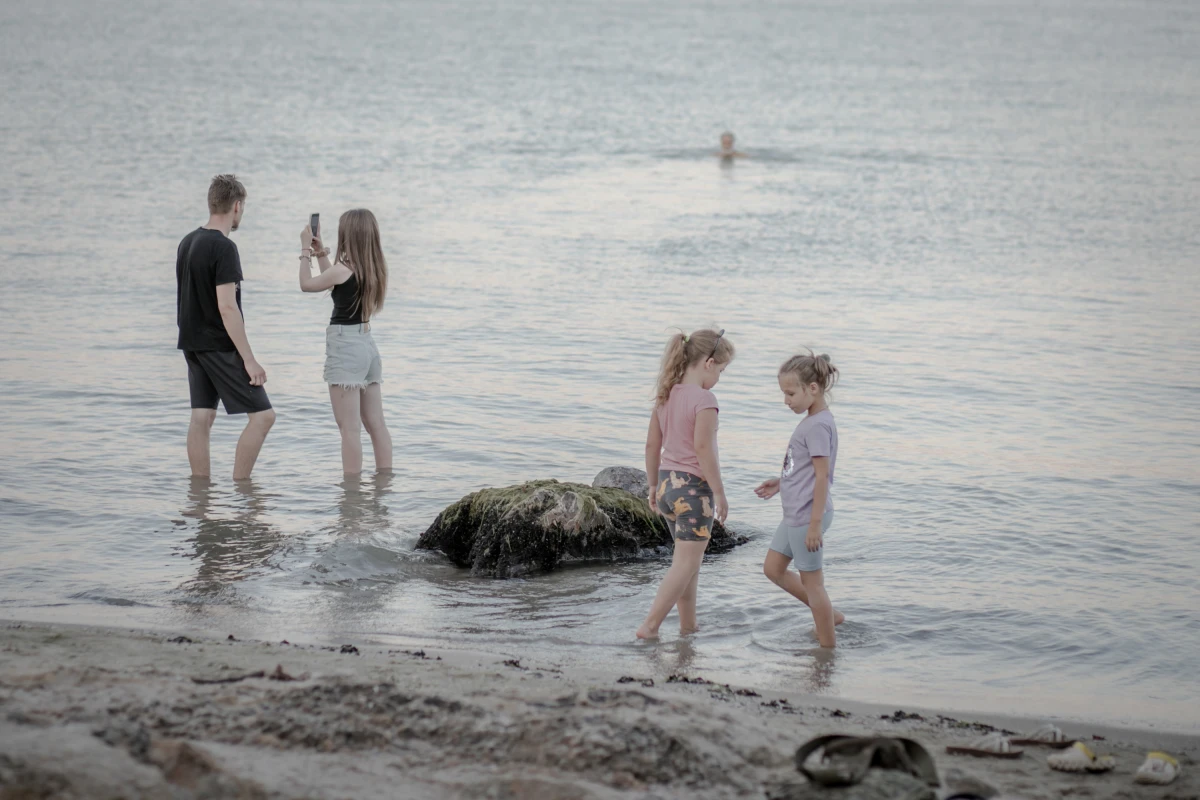 Life goes on at Odesa's beaches this summer, where the waves wash away worries, if only for a moment.