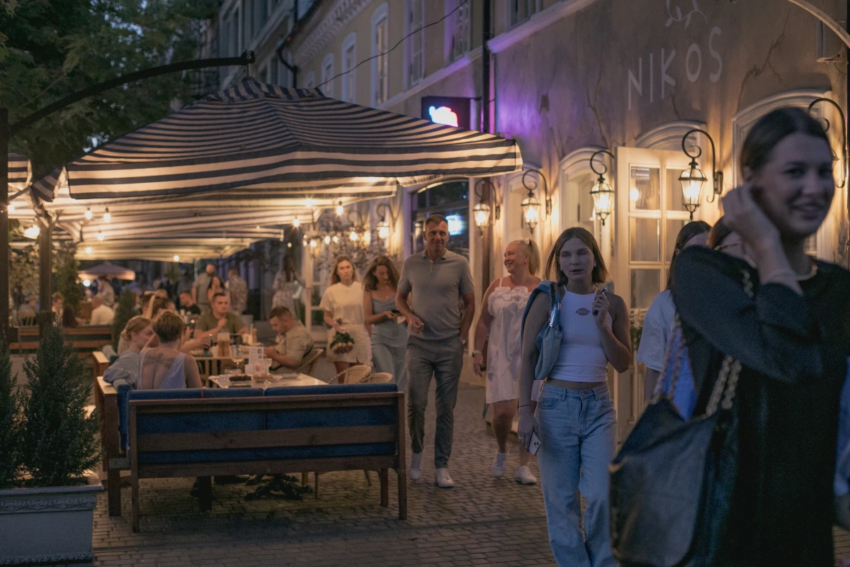 People stroll along one of Odesa's main tourist streets on the evening of Aug. 14, where it's hard to find an empty table at the restaurants.