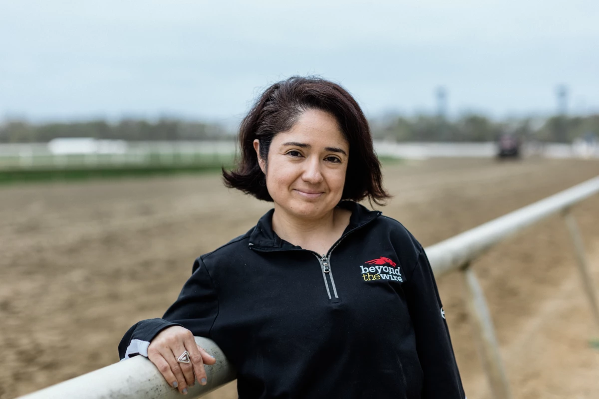 Diana Pinones, 40, poses for a portrait at Laurel Park in Laurel, Md., on April 5, 2025. Pinones works at various capacities with many of the immigrant workers at Laurel Park.