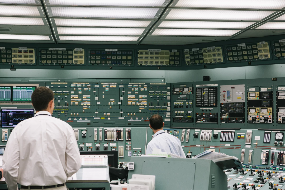 Reactor operators work in the control room at the Three Mile Island nuclear power plant in Middletown, Pennsylvania, U.S., on April 11, 2018. A new draft executive order could shrink the size of the NRC while overhauling its regulations.