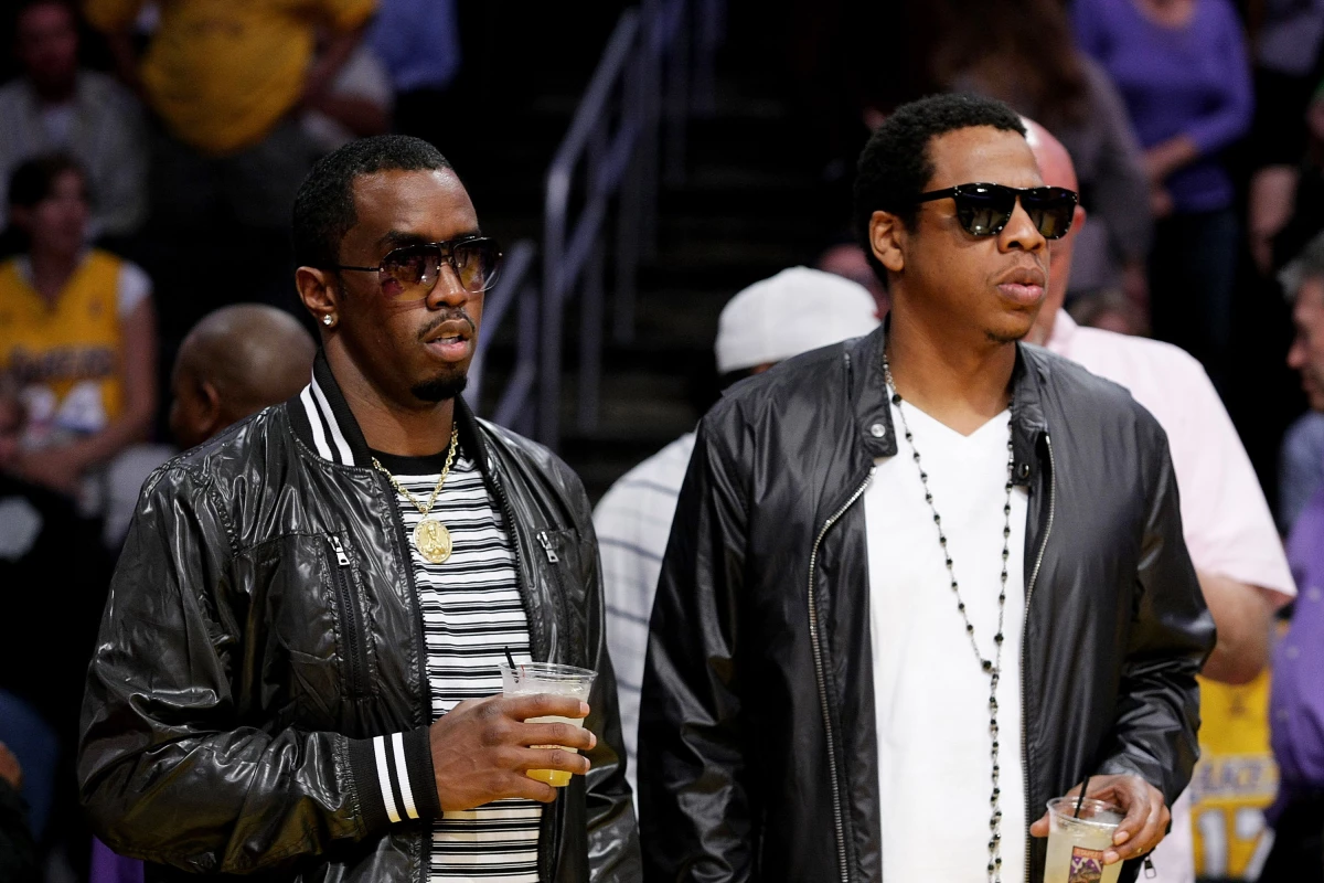 Sean Combs (left) and Jay-Z attend the Los Angeles Lakers vs. Houston Rockets game at Staples Center on May 4, 2009, in Los Angeles.