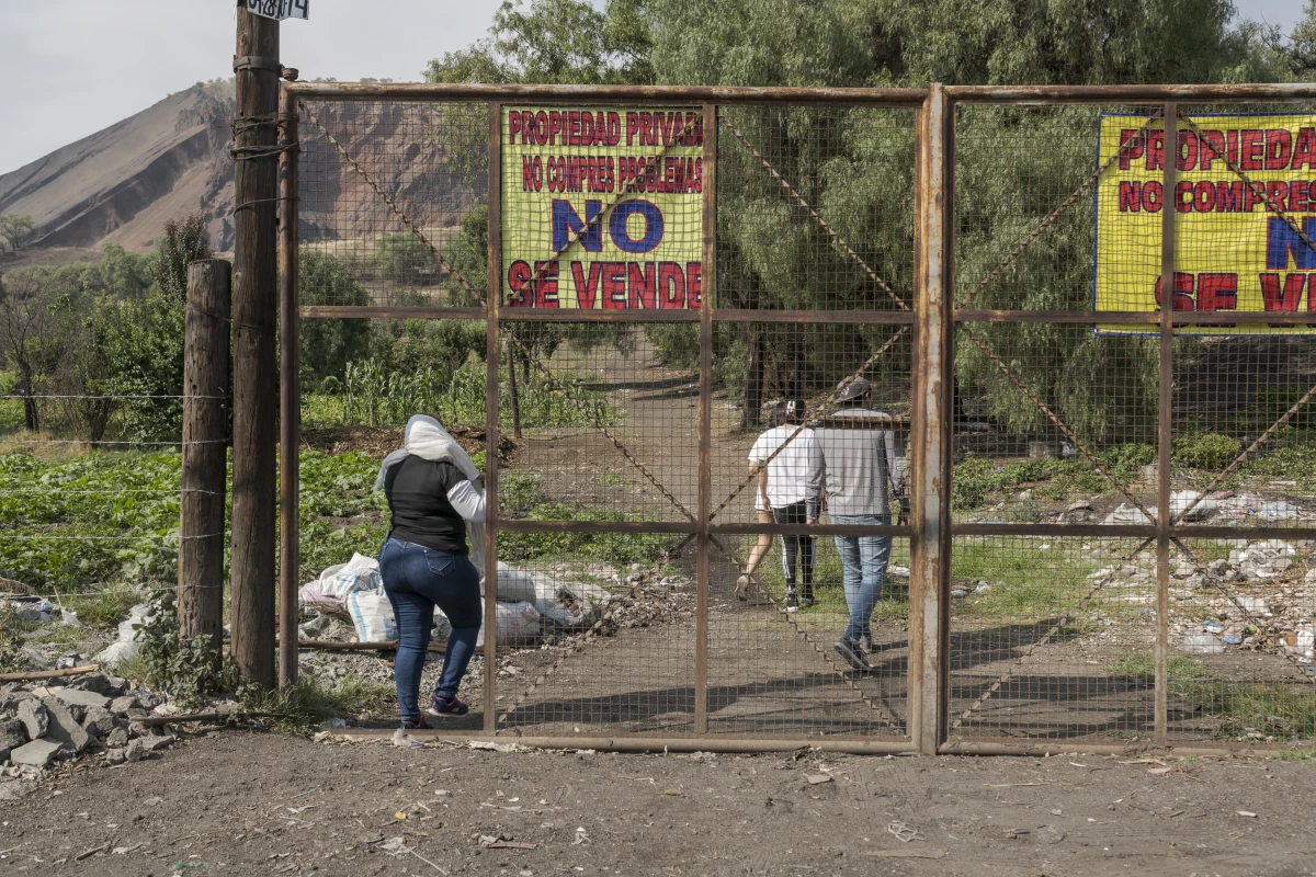 Cecilia Flores and a group of volunteers access a property near the Xaltepec volcano to continue their search for clandestine human graves. on Tlahuac, Mexico City, May 28, 2024.