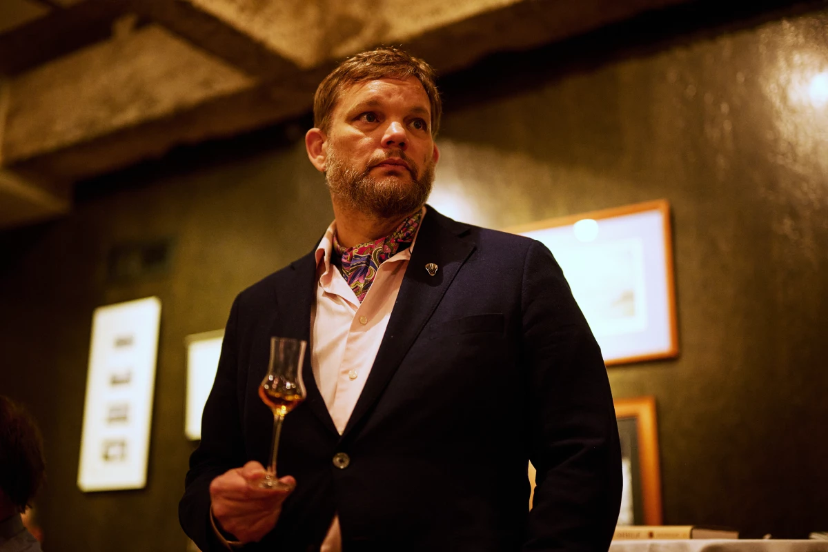 Iraq war combat veteran Fred Minnick hosts a bourbon tasting dinner at Cordelia, a restaurant in Cleveland's historic district, as part of a tour for his new book, Bottom Shelf: How a Forgotten Brand of Bourbon Saved One Man's Life.
