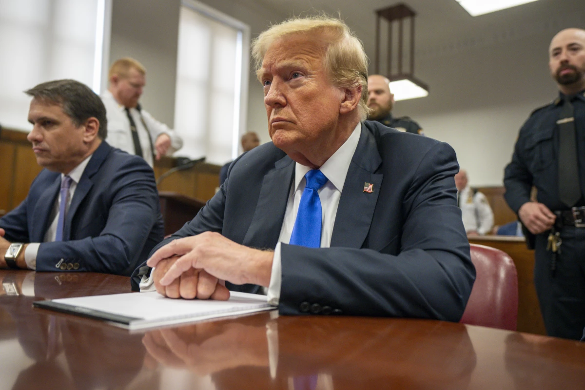 President Trump appears in court for his hush money trial at Manhattan Criminal Court on May 30, 2024 in New York City. At left is his attorney, Todd Blanche.