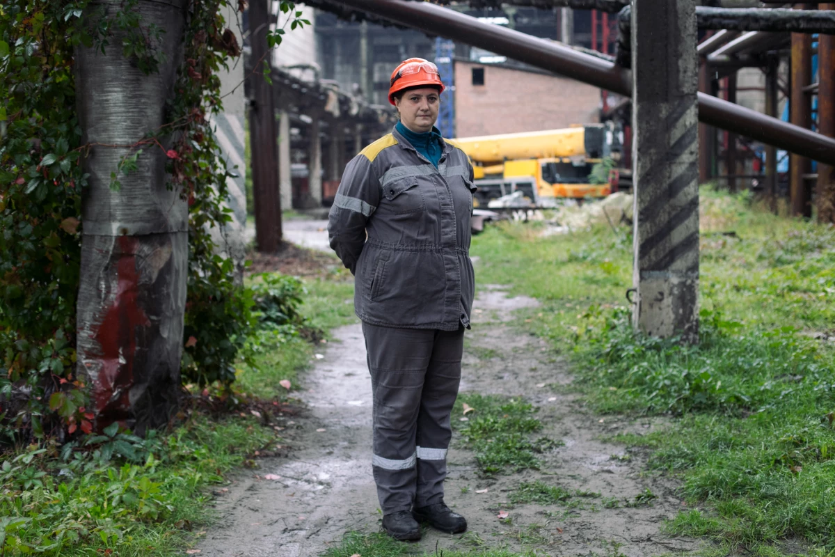 Lesia used to operate the conveyor belt at a Ukrainian energy station that brings coal to the plant's furnaces. Now she clears the belt's wreckage as a new one is built. She has survived three rocket strikes on the plant. 'We have a constant feeling of fear,' she says.