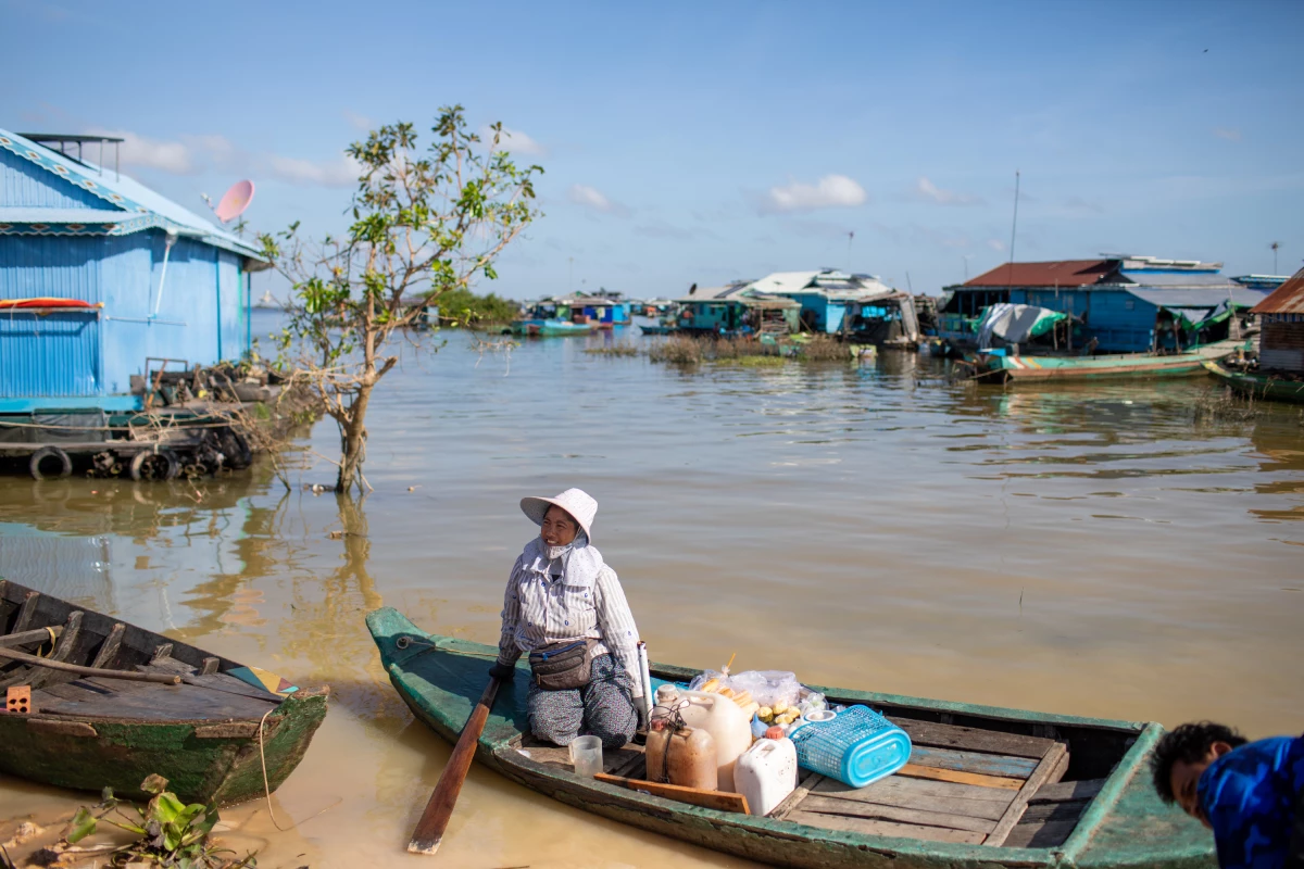 Cambodia is one of the most flood-prone countries in the world, with both the Mekong River and the massive Tonle Sap lake. Forty-year-old Douch Bopha lives in a floating village on the edge of the lake and sells food each day to local fishermen.