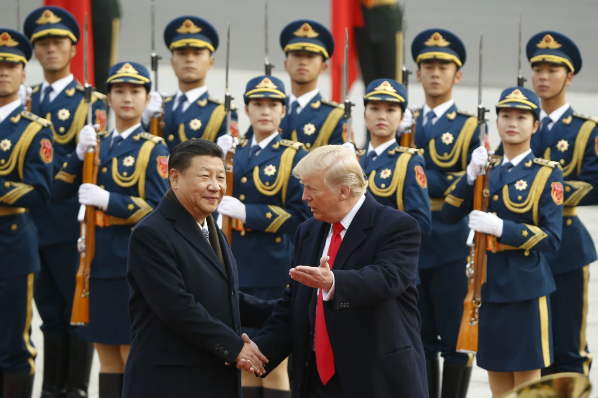 President Trump takes part in a welcoming ceremony with Chinese President Xi Jinping on Nov. 9, 2017, in Beijing.