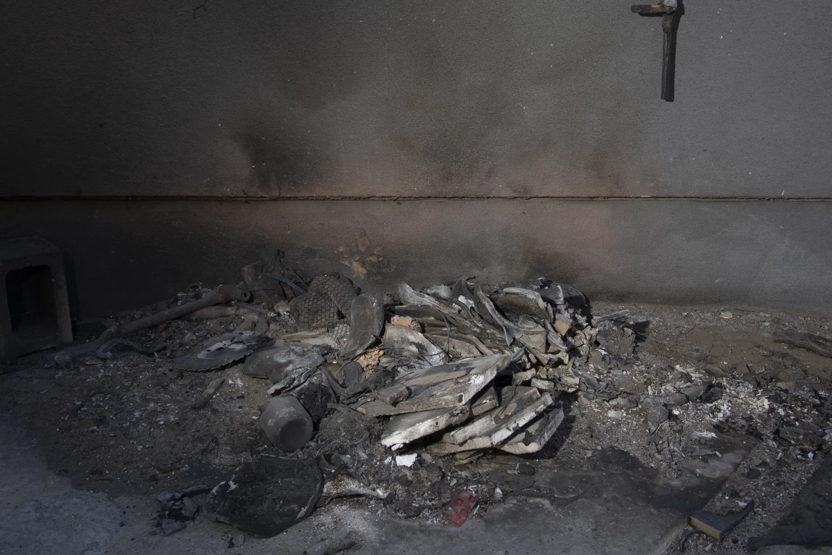 A flammable item burned at a house in Pasadena, but because the siding is made of fire-resistant stucco, the flames didn't spread to the house itself.