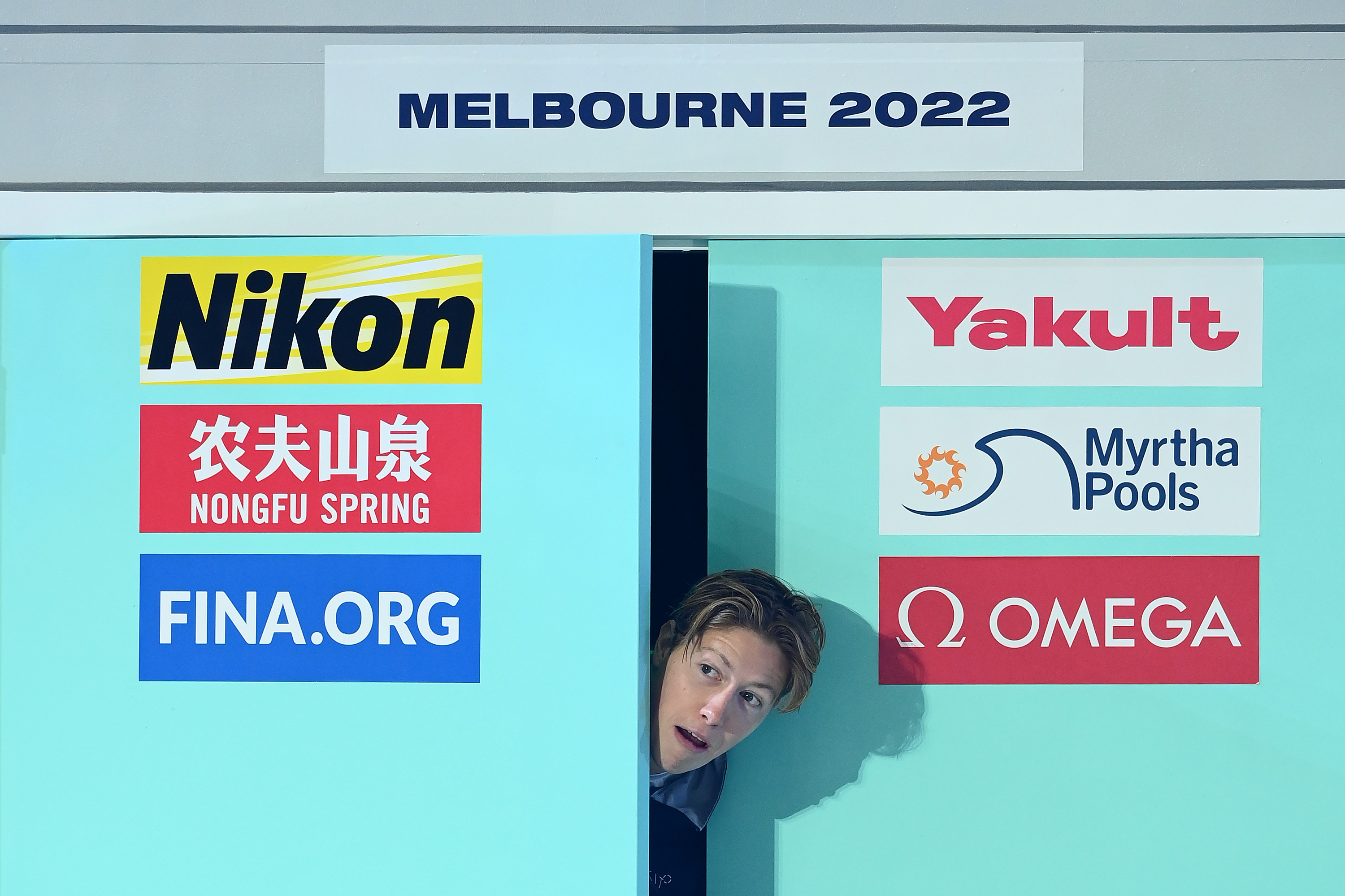 Henrik Christiansen, pictured at a 2022 championship medal ceremony in Australia, is chasing medals as well as chocolate muffins in his third Olympic Games.