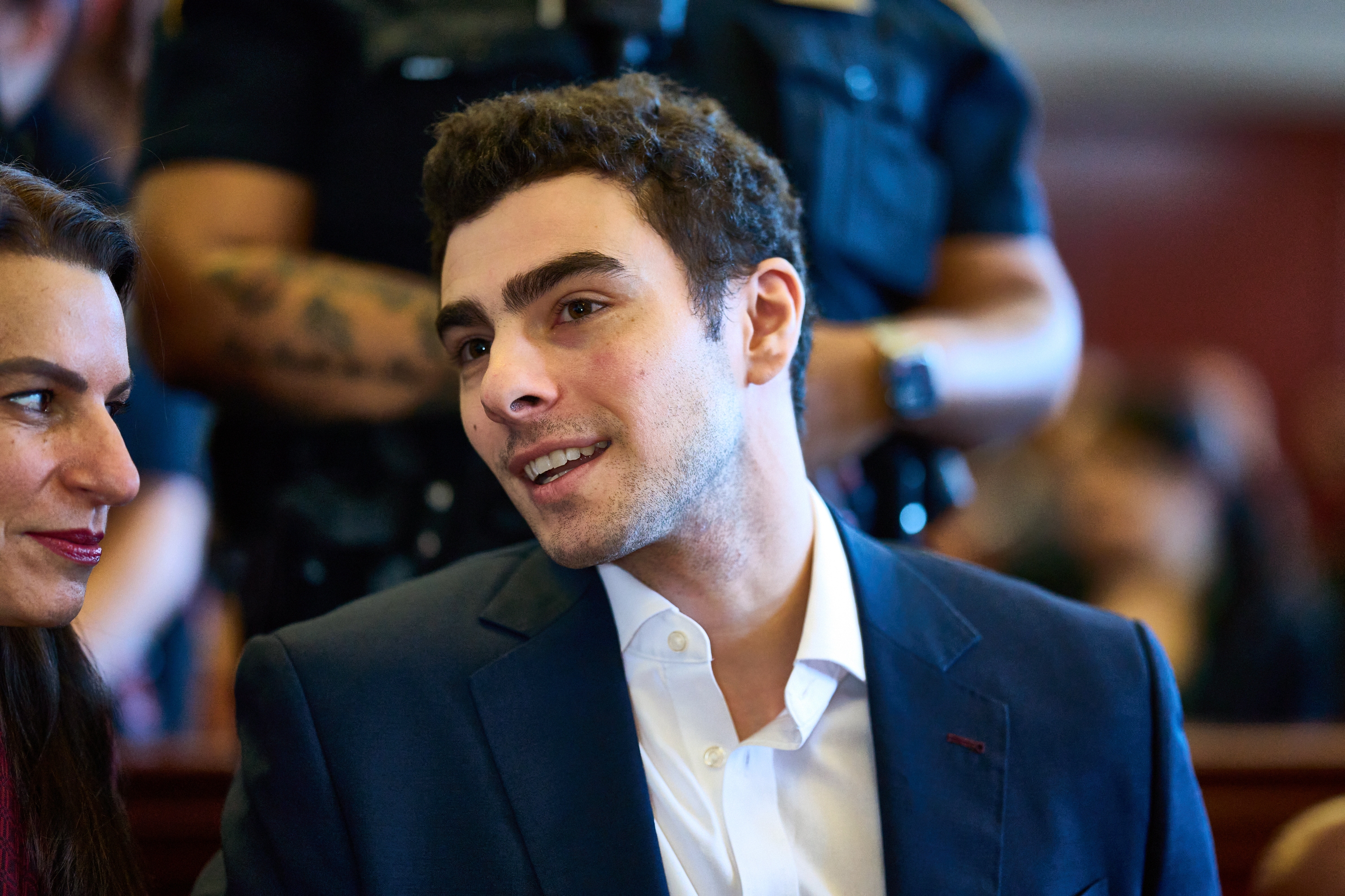 Luigi Mangione speaking with his attorney Karen Agnifilo in Manhattan Criminal Court on December 12, 2025 in New York City.