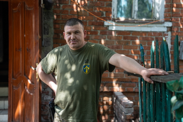 Yurii Lunyov, commander of the 2nd Rifle Battalion of the 57th Brigade, poses for a portrait outside of their command center not far from Vovchansk in Kharkiv region, Ukraine on May 29.