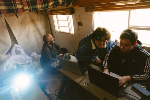 Students from Cal Poly Pomona strategize while piloting the Helelani rover.