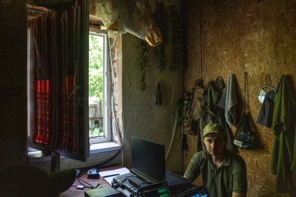Rodion, a soldier with the 57th brigade, is seen in the command center for an artillery unit in Kharkiv region, Ukraine on May 29.