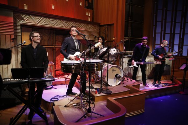 The 8G Band on February 24, 2014 — the very first episode of Late Night with Seth Meyers. Left to right: Eli Janney, Fred Armisen, Kim Thompson, Syd Butler and Seth Jabour.