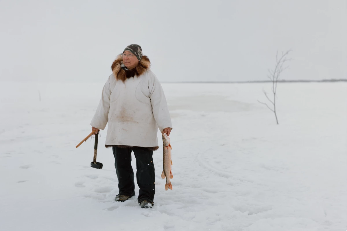 Dominic Hunt holds a catch from a blackfish trap on the Yukon River near Emmonak, Alaska. Dominic and his wife Lala are community volunteers with Qungasvik who help organize traditional subsistence activities like ice fishing and tool crafting. “Growing up, I rarely heard about suicide”, says Hunt, reflecting a view that’s echoed by many Elders who were alive prior to the era of residential boarding schools. It wasn’t until his own brother died by suicide that Hunt was first confronted by the issue head-on.