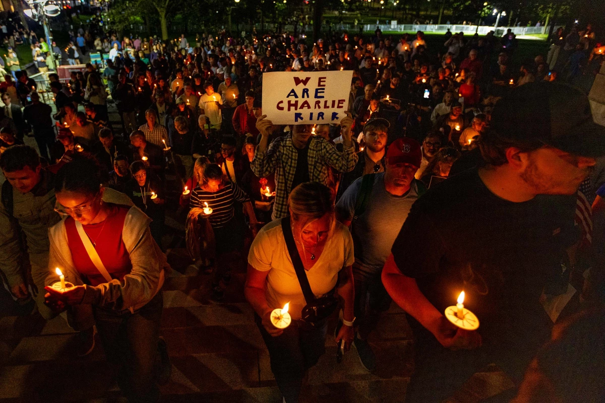 Vigil attendees begin walking up the stairs of the Boston Common to gather in front of the Massachusetts State House during the Prayer Vigil for Charlie Kirk on September 18, 2025.