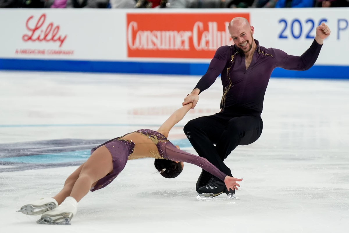 Ellie Kam and Danny O'Shea are representing Team USA in pairs skating, which — unlike ice dance — allows overhead lifts and throws.