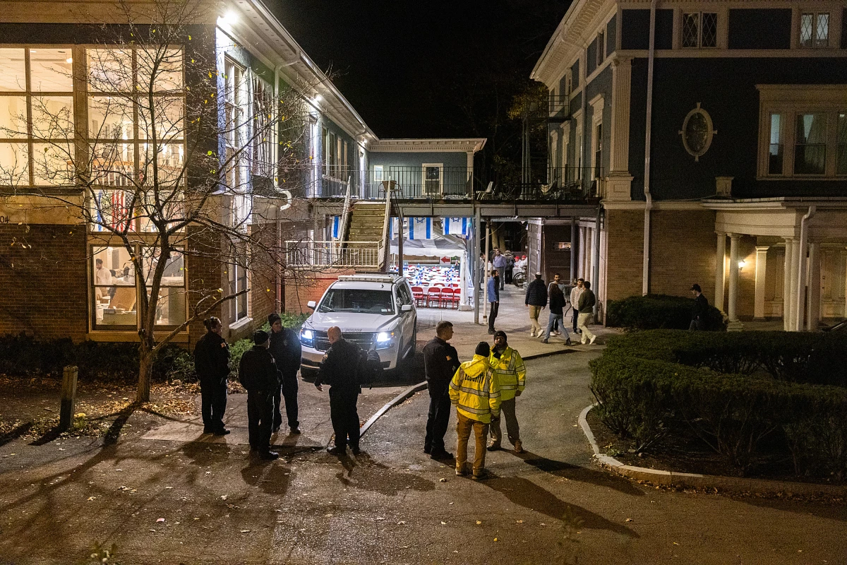 Police and security stand outside the Center for Jewish Living at Cornell University in Ithaca, N.Y., in early November, after antisemitic threats left the community on edge.