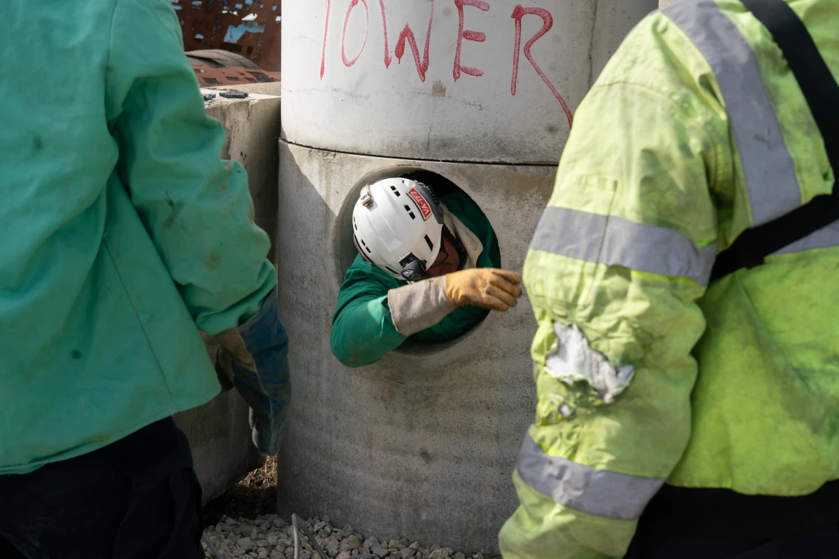 A search and rescue expert climbs out of a concrete tower as part of a search and rescue training offered by Ohio Task Force 1.