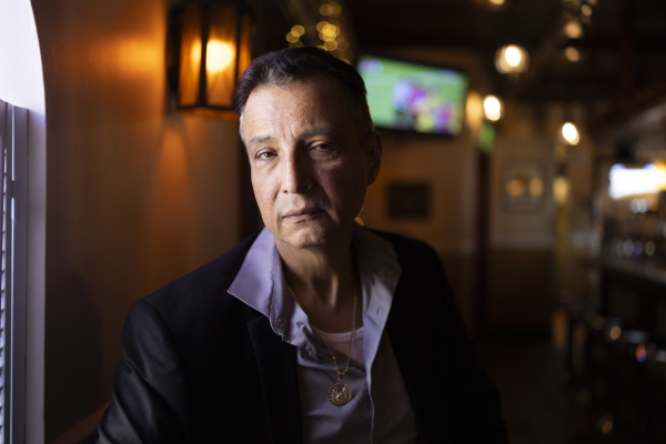 Former Democratic operative David Rodriguez, a Puerto Rican now supporting Donald Trump, sits in the Philadelphia restaurant Tierra Colombiana on Sept. 21.