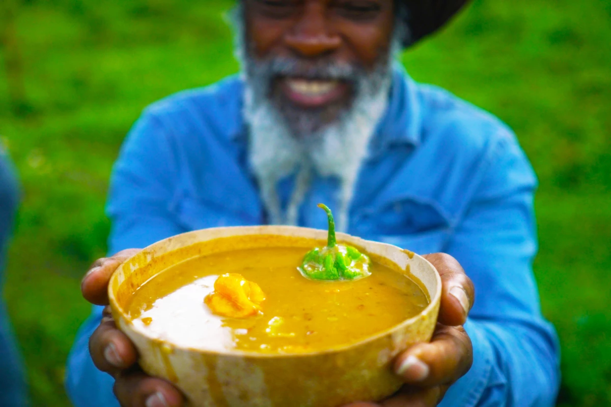 Chef Tony Allen presents a fresh bowl of ital sip in a hollowed-out calabash gourd.