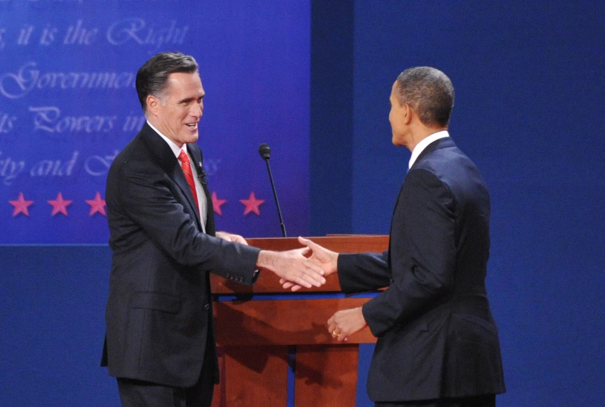 Republican presidential candidate Mitt Romney shakes hands with President Barack Obama on Oct. 3, 2012 after the first presidential debate in Denver, Colorado.