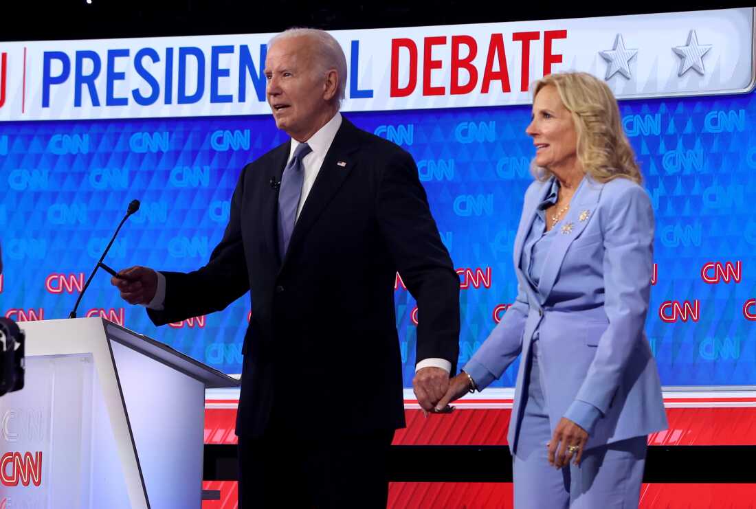 Joe Biden walks off with Jill Biden following the presidential debate on June 27, 2024, in Atlanta.
