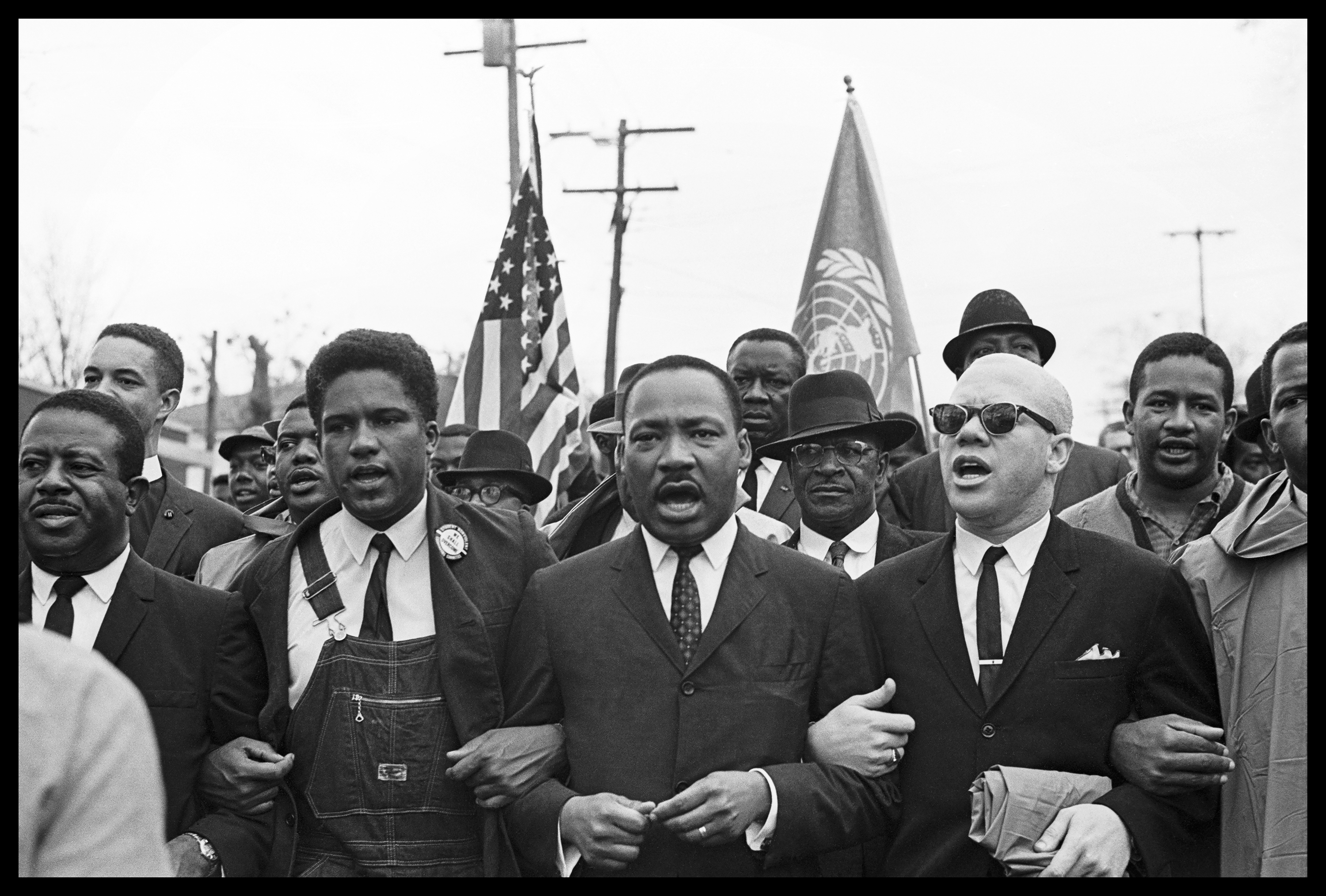(From left) Rev. Ralph Abernathy, James Forman, Dr. Martin Luther King Jr. and Rev. Jess Douglas lead the voting rights march to the Montgomery County Courthouse.