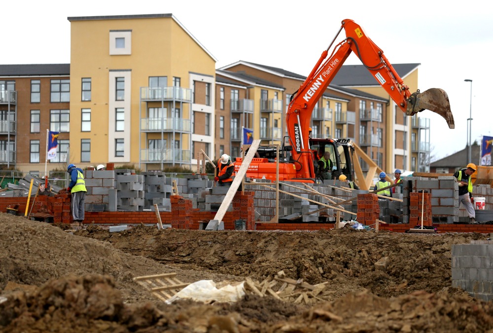 Construction workers build new houses (Getty Images)