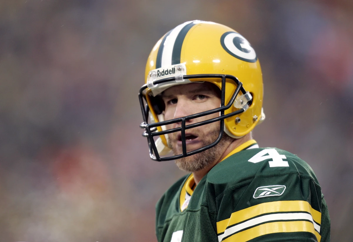 Former NFL all-star quarterback Brett Favre says he has Parkinson's disease. Favre played 20 seasons in the NFL, mostly with the Green Bay Packers. He retired in 2011. Favre won the Super Bowl and was a three-time NFL MVP. He also had his share of concussions and said he had often had memory loss.
