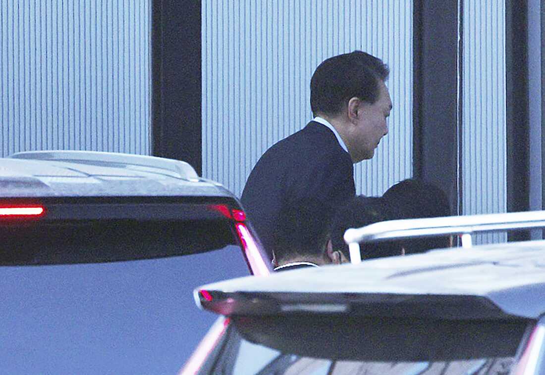 Impeached South Korean President Yoon Suk Yeol arrives at the Corruption Investigation Office for High-ranking Officials in Gwacheon, South Korea on Wednesday.