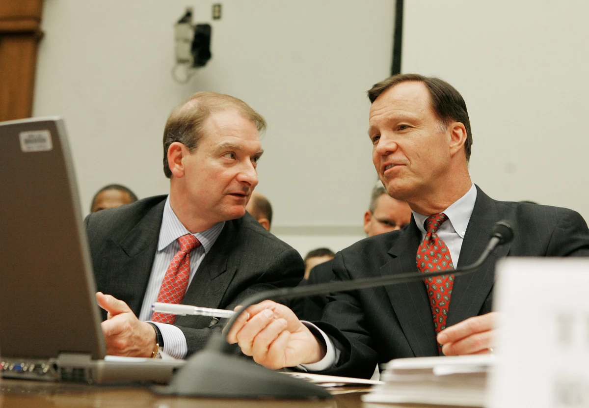 Paul Atkins, left, talks to then SEC Chair Christopher Cox during a House Financial Services Committee hearing on Capitol Hill in Washington, D.C., on June 26, 2007. Atkins was then an SEC commissioner, and he has now been picked by President-elect Trump as the next head of the agency,