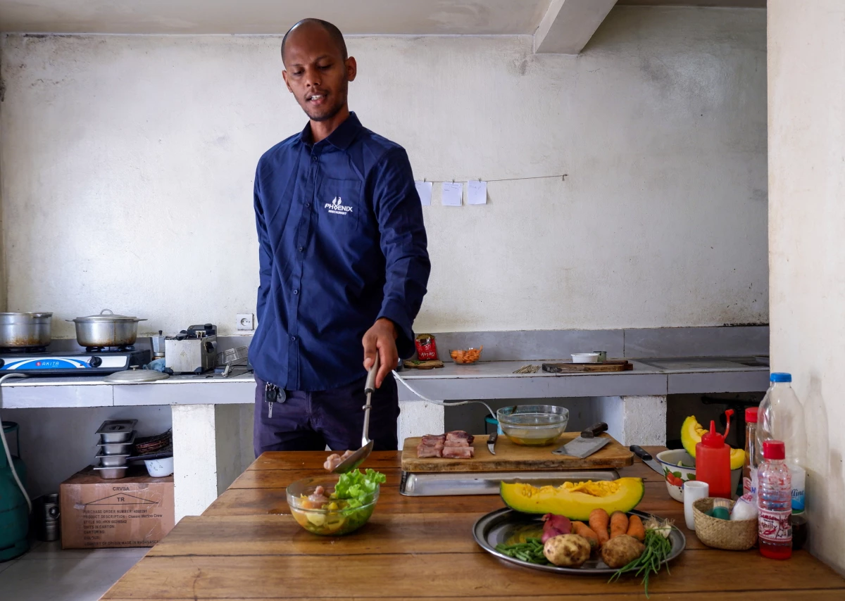 Chef Toky Razafimaharo, owner of the Phoenix Lounge in Antananarivo, prepares lasopy soucril.