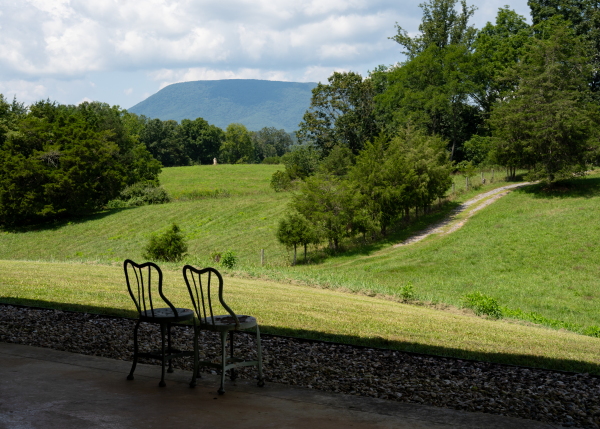 Chairs facing the mountains near Sally Mann's home in Virginia, seen on August 16, 2025.