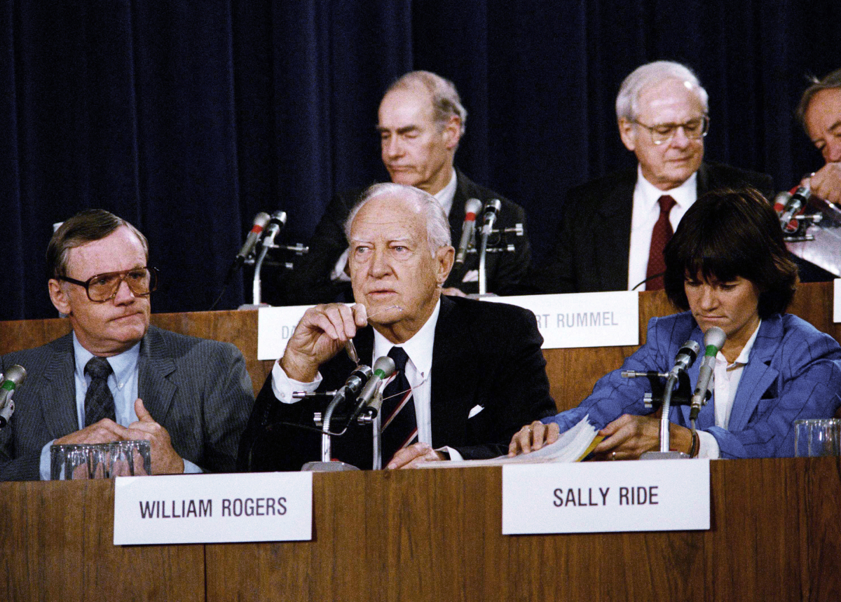 The chairman of the Presidential Commission on the Space Shuttle Challenger Accident, William Rogers (center), and panel members Neil Armstrong (left) and Sally Ride attend one of the hearings concerning the disaster, on Feb. 25, 1986, in Washington, D.C.