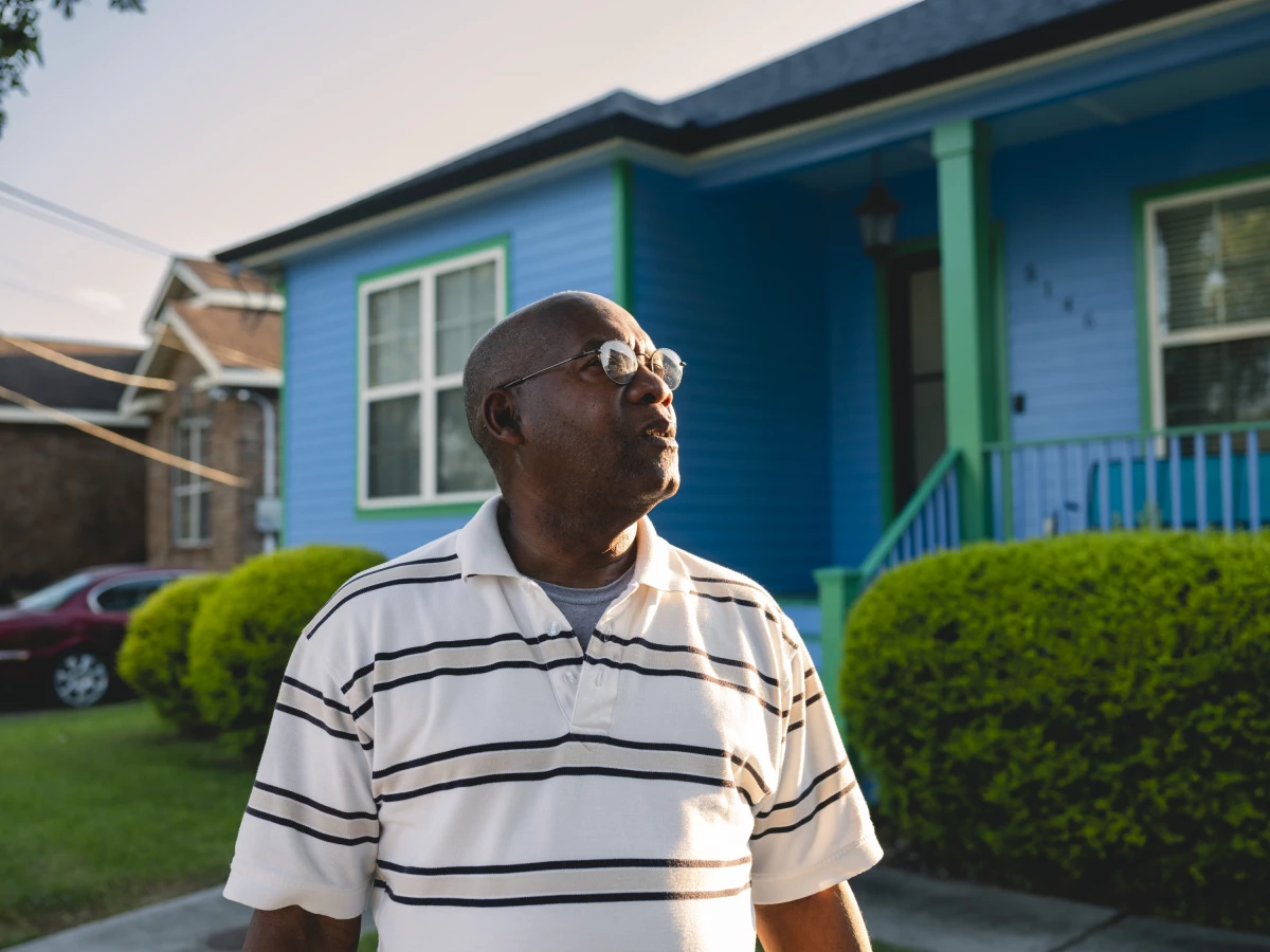 Kenneth Avery, life-long resident of the Desire/Florida neighborhood in the upper 9th ward of New Orleans, in front of his home on Aug. 25, 2025. His house was flooded during Katrina, but he came back very quickly after evacuating, and stayed. His house, and 65 others in the neighborhood were recently found to be on toxic ground. He was bought out, and just moved to this new home in 2023.