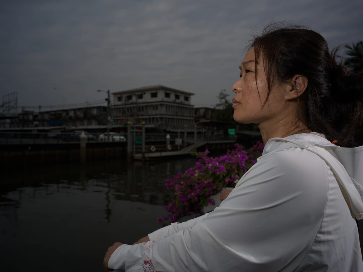 False accusations of making bomb threats and an alleged con left Liu Fengling and her two children stuck in Thailand for nearly a year. Here, she's seen in Bangkok on Jan. 29.