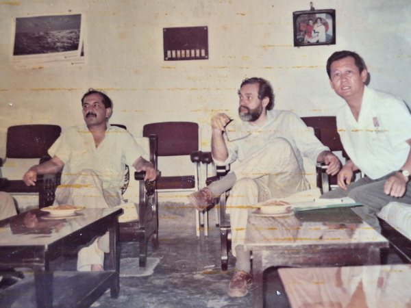 Richard Cash, center, with Mushtaque Chowdhury (mustached). Photo from mid-90s. "To promote Brac and its work, Richard used to bring important visitors from different parts of the world. One such visitor was a Japanese entrepreneur interested in international development. I took both of them for a visit to our Manikganj project, about 40 miles outside of Dhaka. The other person in a photo was a local staff member of brac." - from Mushtaque