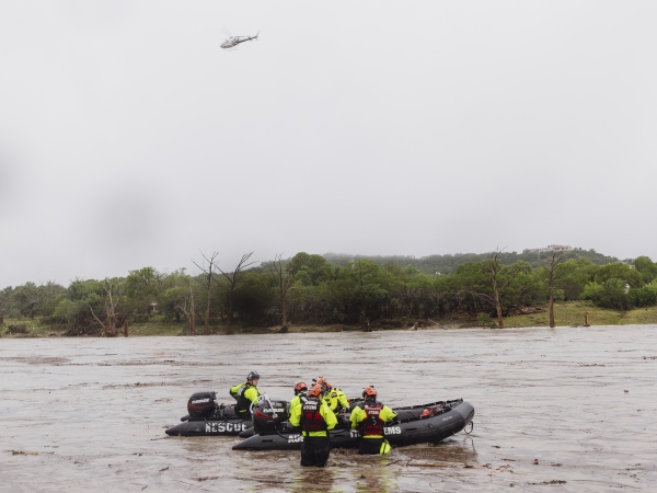 First responders deploy boats along the Guadalupe River after deadly flooding on Friday, July 4, 2025, in Kerrville, Texas.