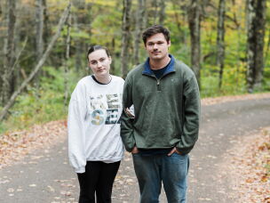 Spruce Knob Lake Campground hosts Kaleb and Ella Skelton, at their site at Spruce Knob on Saturday, Oct. 10 2026 in Spruce Knob, W.Va. The couple from Texas have been at the site since April and said they have never seen darker skies than atop Spruce Knob.