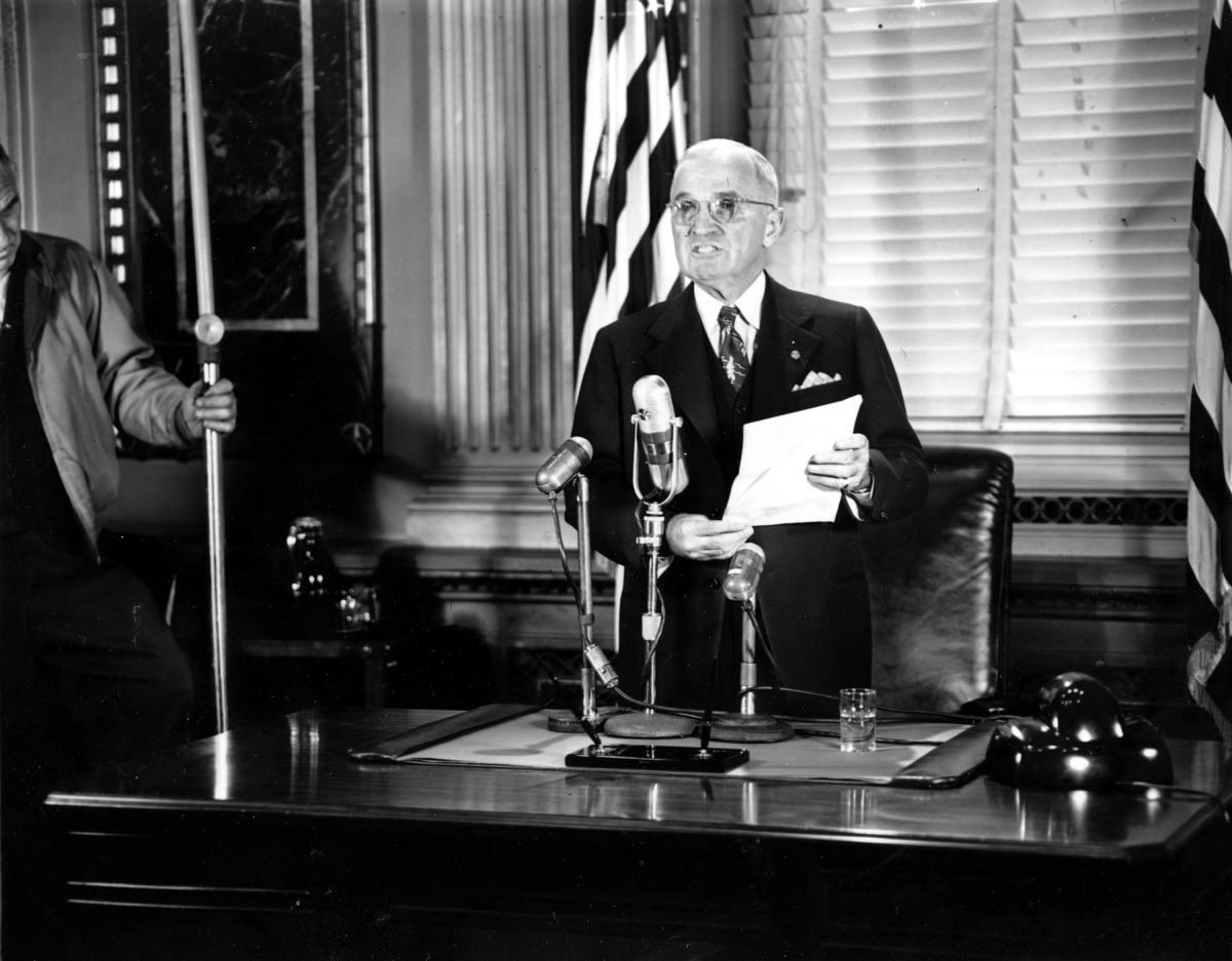 President Harry Truman speaks in front of a camera crew at the White House on Nov. 30, 1950. Truman warned that U.N. forces would not back down in Korea and that the atom bomb would be used if necessary to meet the military situation in the Korean War.