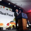Robert F. Kennedy Jr. stands at a podium and speaks at an event in Washington, DC.