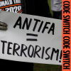 A sign at a 2019 protest reading "ANTIFA = TERRORISM!"