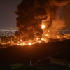 Fire and smoke rise after an Israeli attack on the Shahran oil depot on June 15 in Tehran, Iran.