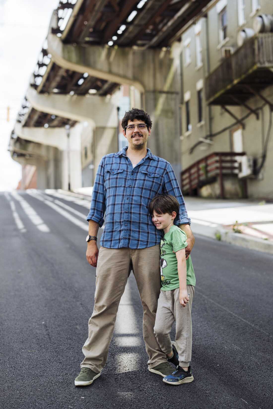Chipper Thurber and his son, Bowen, 5,  in Morgantown, W.Va.  Thurber moved his family from Jamestown, Pa. to West Virginia and initially thought the relocation incentives were "too good to be true." 