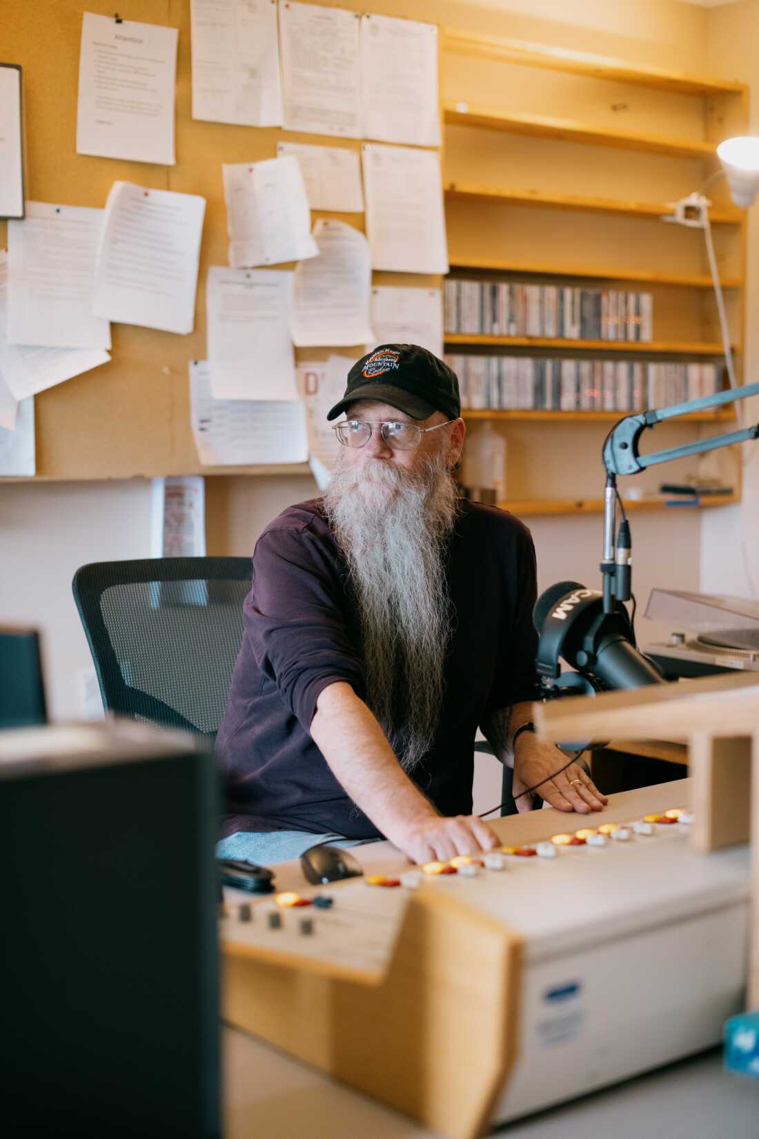 Scott Smith, Allegheny Mountain Radio's general manager, sits in the main broadcasting studio at station WVLS in Monterey, Va. Smith says Congress' decision last week to slash public media funding could wipe out up to 65 percent of his budget. 
