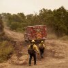 Firefighters work against the advancing Lake Fire in Los Olivos, Calif., Saturday, July 6, 2024.
