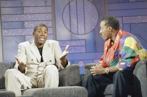 Magic Johnson, left, made his first public appearance on The Arsenio Hall Show after announcing he tested positive for HIV in Nov. 1991.
