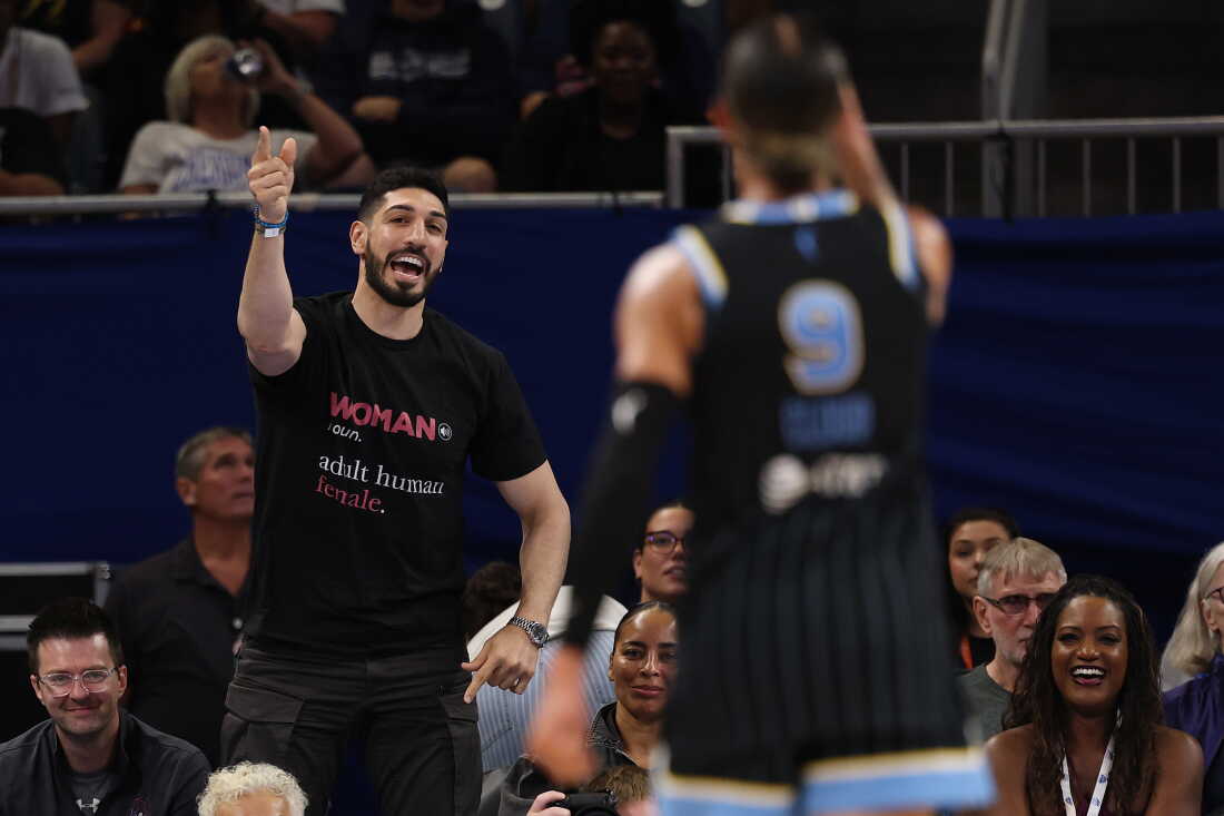 Former basketball player Enes Kanter Freedom and Natasha Cloud #9 of the Chicago Sky yell at one another during the second half between the Chicago Sky and the Indiana Fever at Wintrust Arena on Aug. 23 in Chicago.